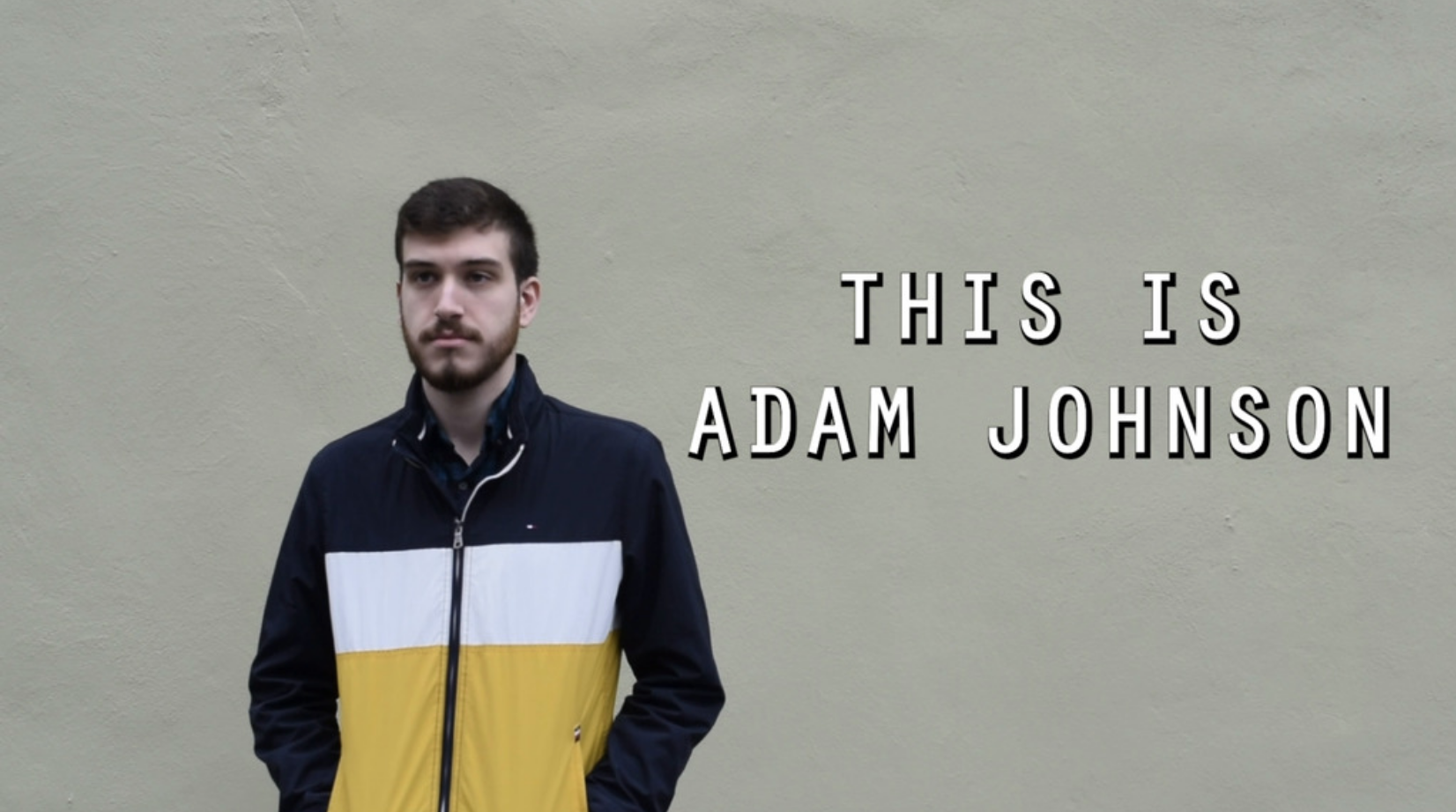 Man standing on wall. Text says "this is adam johnson"