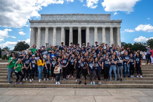 group of students in front of lincoln memorial