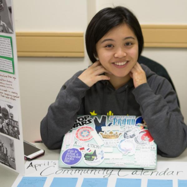 gw student smiles at service event