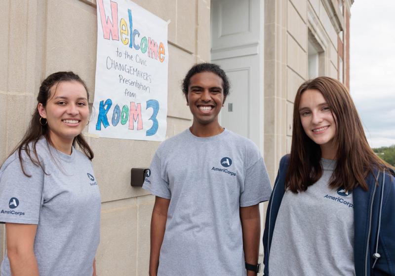 GW student interns Liseth Widman, Joshua Abraham and Sarah Mann oversaw student civic engagement projects, which were presented in front of friends, family and community members on Friday, Aug. 4, at Eliot-Hine Middle School.